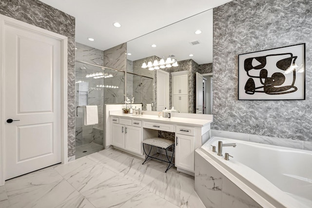 bathroom featuring vanity, tile walls, and separate shower and tub