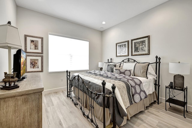 bedroom featuring light wood-type flooring