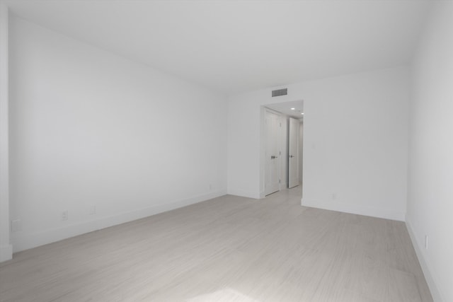 empty room with light wood-type flooring