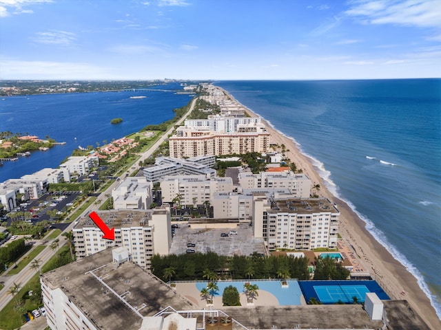 aerial view featuring a view of the beach and a water view