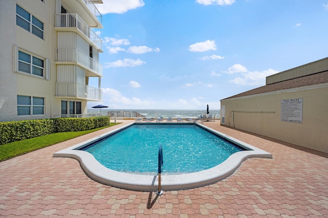 view of pool with a patio area