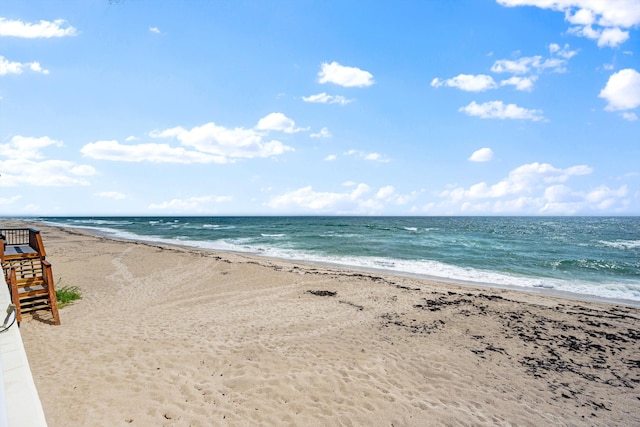 property view of water featuring a beach view