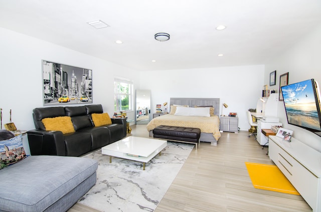 bedroom featuring light wood-type flooring