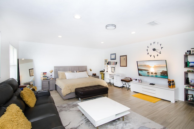 bedroom featuring light wood-type flooring