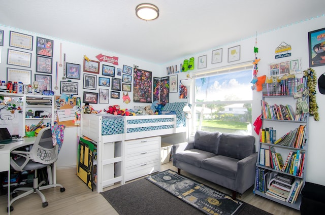 home office featuring hardwood / wood-style flooring