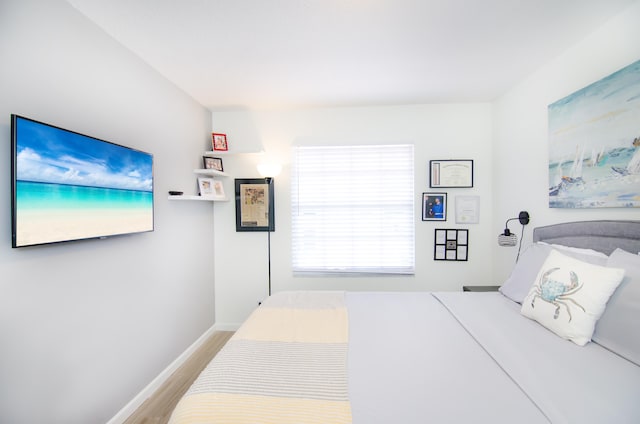 bedroom featuring hardwood / wood-style floors