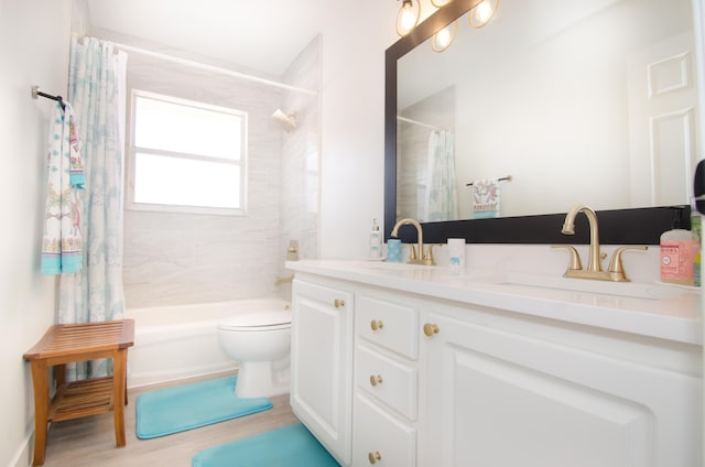 full bathroom with toilet, shower / tub combo, vanity, and wood-type flooring