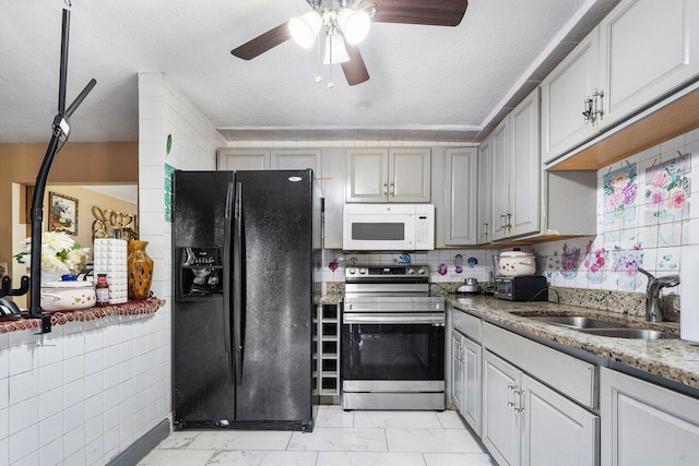 kitchen featuring sink, electric range, black fridge with ice dispenser, gray cabinets, and a textured ceiling