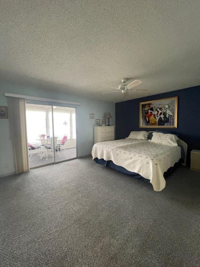 unfurnished bedroom featuring ceiling fan, a textured ceiling, and carpet floors