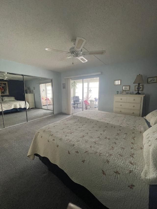 carpeted bedroom with a textured ceiling, a closet, and ceiling fan