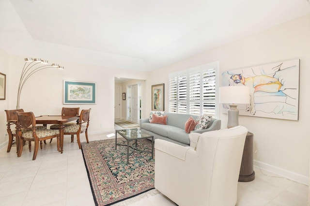 living room featuring light tile patterned flooring