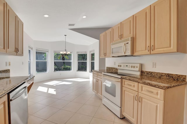 kitchen featuring an inviting chandelier, light brown cabinets, decorative light fixtures, and white appliances