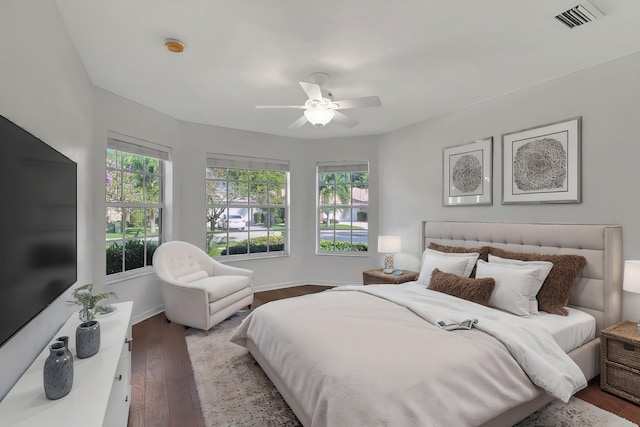 bedroom featuring wood-type flooring and ceiling fan