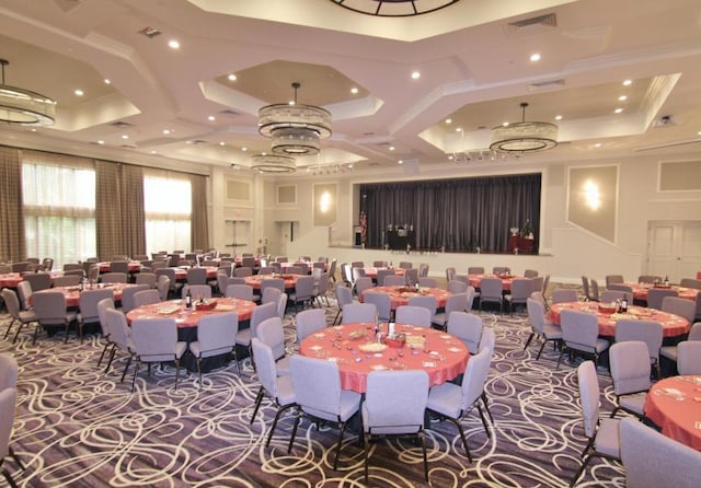 carpeted dining space with visible vents, recessed lighting, coffered ceiling, and crown molding