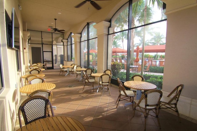 sunroom / solarium featuring tile patterned floors