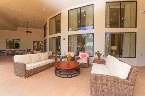 view of patio featuring an outdoor living space and ceiling fan