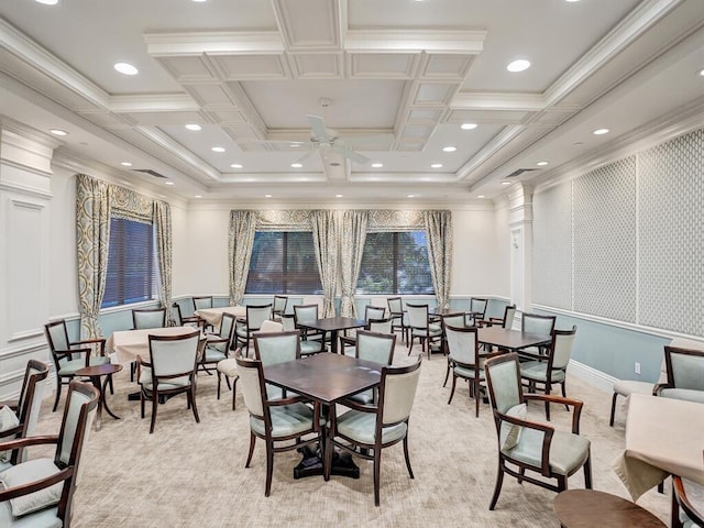 dining room with ornamental molding, a ceiling fan, visible vents, and decorative columns