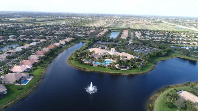birds eye view of property featuring a residential view and a water view