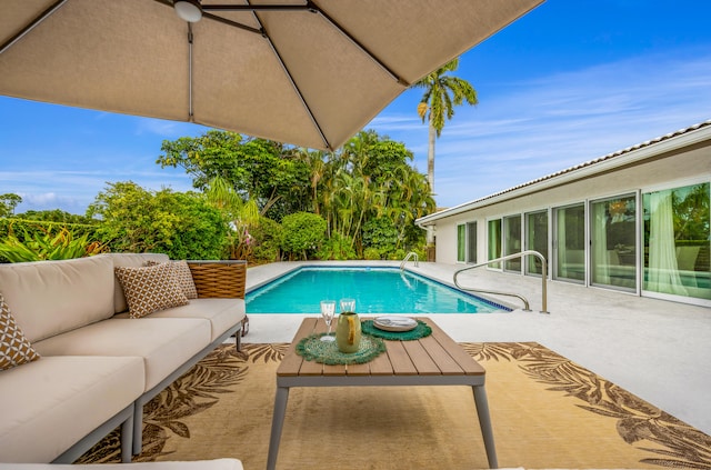 view of pool featuring a patio and an outdoor hangout area