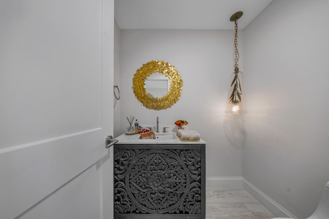 details with hardwood / wood-style floors and sink