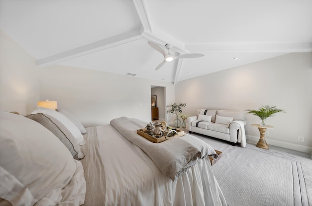 carpeted bedroom with vaulted ceiling with beams and ceiling fan