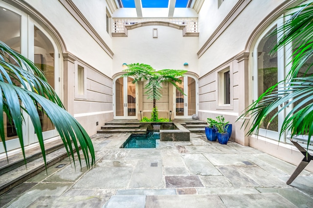 view of patio featuring french doors