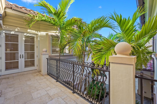 balcony featuring french doors