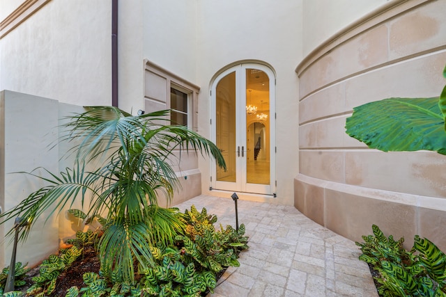 entrance to property featuring french doors