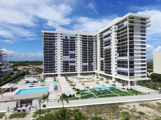 view of property featuring a community pool