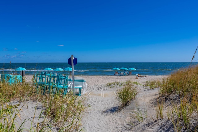 property view of water featuring a view of the beach