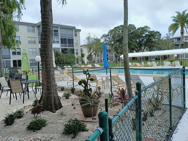 view of pool featuring a patio