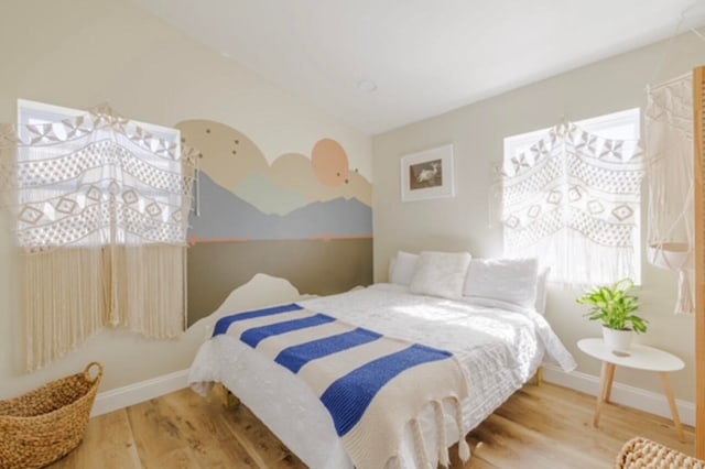 bedroom featuring hardwood / wood-style floors