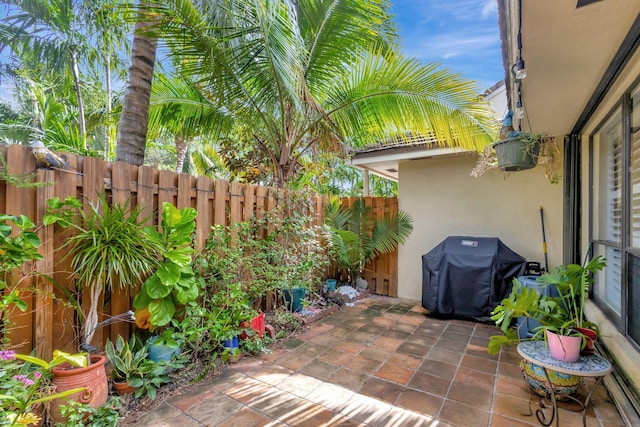 view of patio with a grill