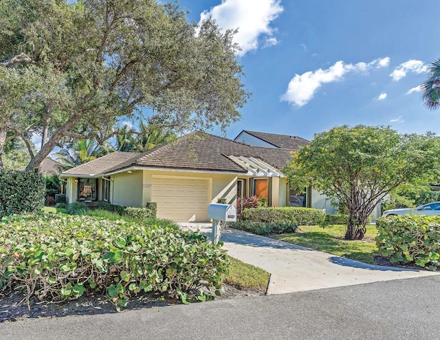 single story home with a garage