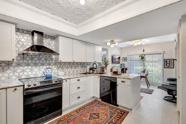 kitchen with white cabinetry, electric stove, kitchen peninsula, and wall chimney range hood