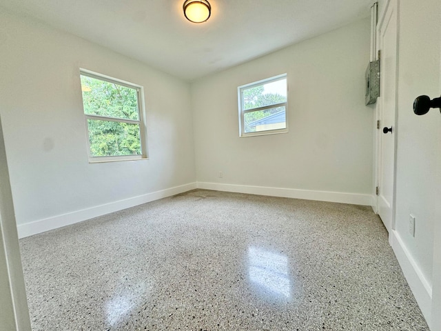 unfurnished room with a wealth of natural light