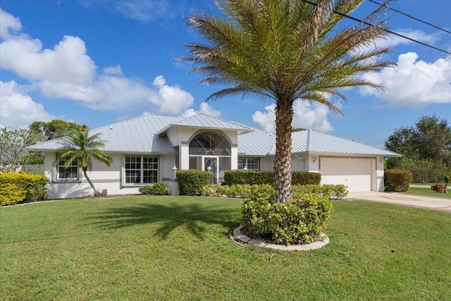 ranch-style house with a garage and a front lawn