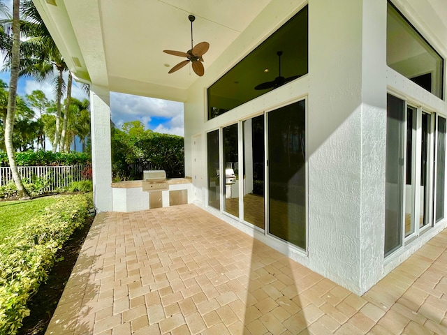 view of patio / terrace featuring ceiling fan and area for grilling