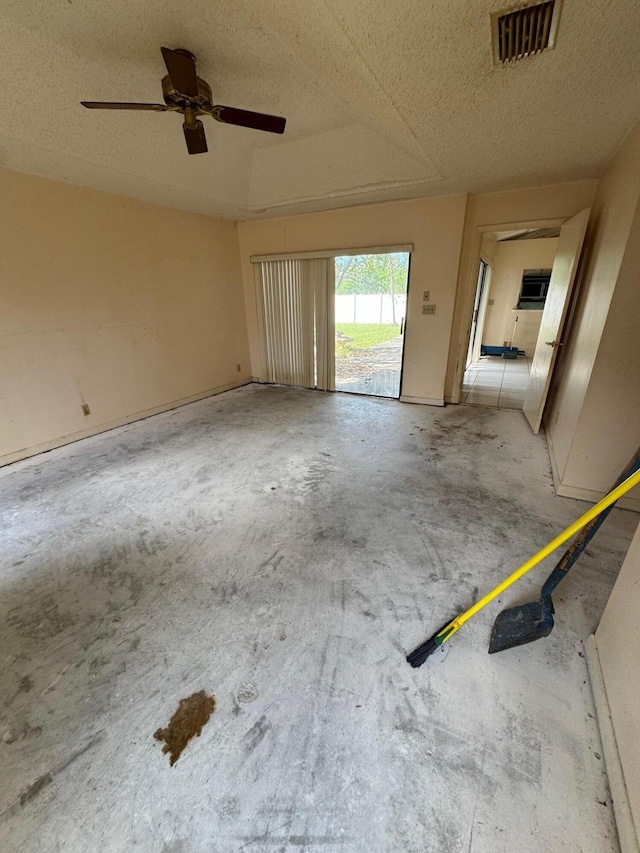 interior space featuring ceiling fan