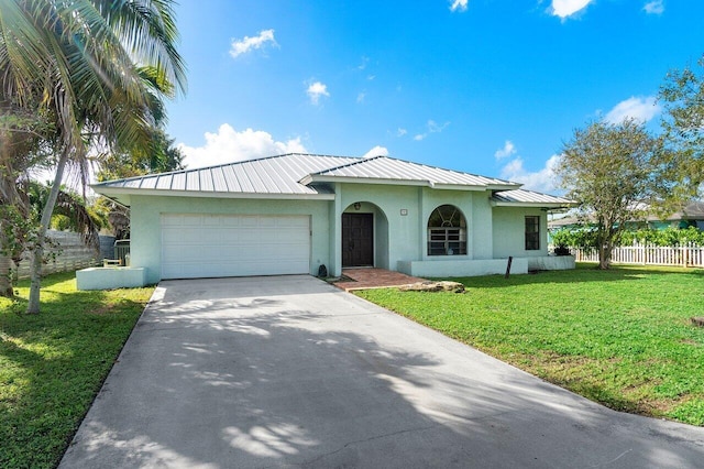 single story home with a garage and a front yard