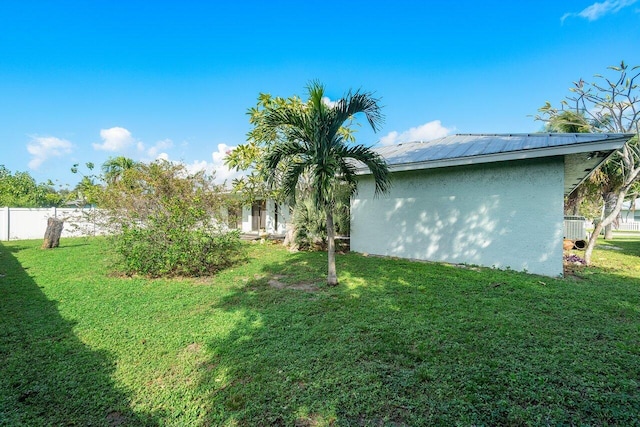 exterior space with a lawn