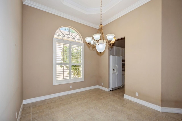 spare room with crown molding, an inviting chandelier, and light tile patterned floors