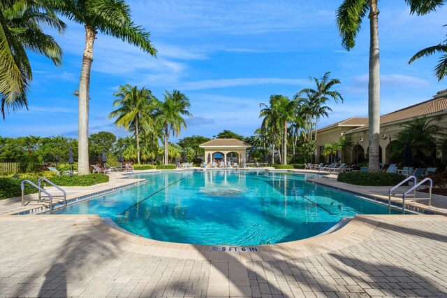 view of pool with a gazebo and a patio area