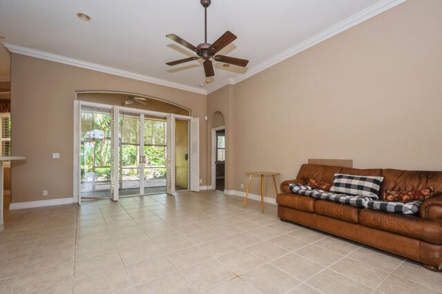 tiled living room featuring ornamental molding and ceiling fan