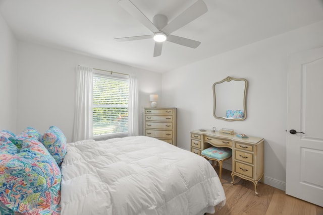 bedroom featuring ceiling fan and light hardwood / wood-style floors