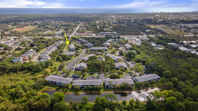 drone / aerial view featuring a water view