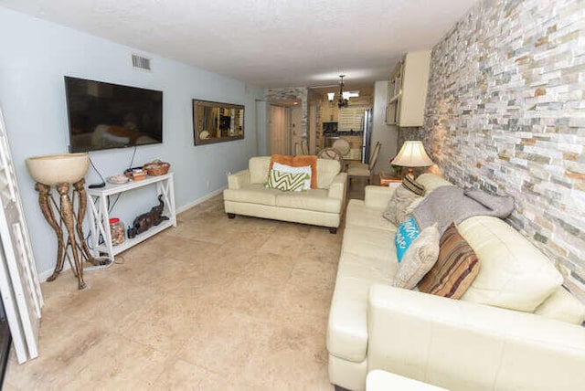 living room featuring a chandelier