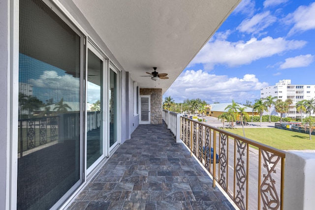 balcony featuring ceiling fan