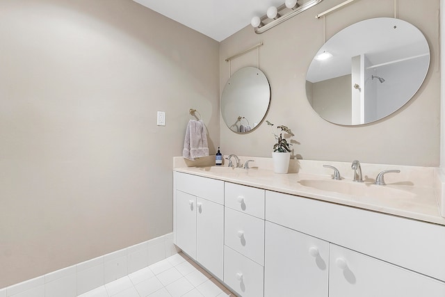 bathroom featuring vanity and tile patterned flooring