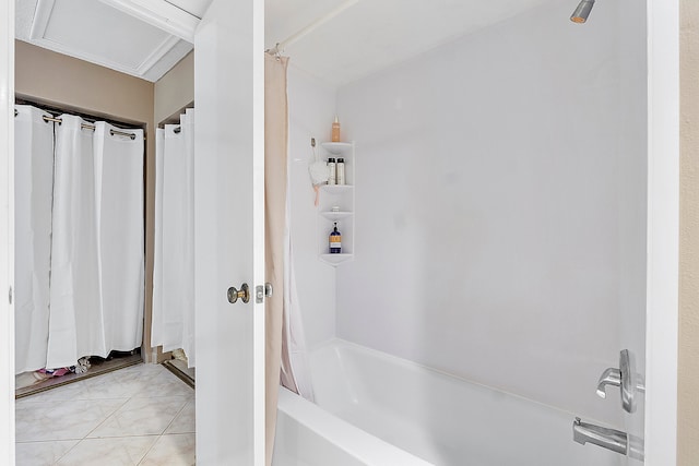 bathroom with shower / bath combo and tile patterned flooring